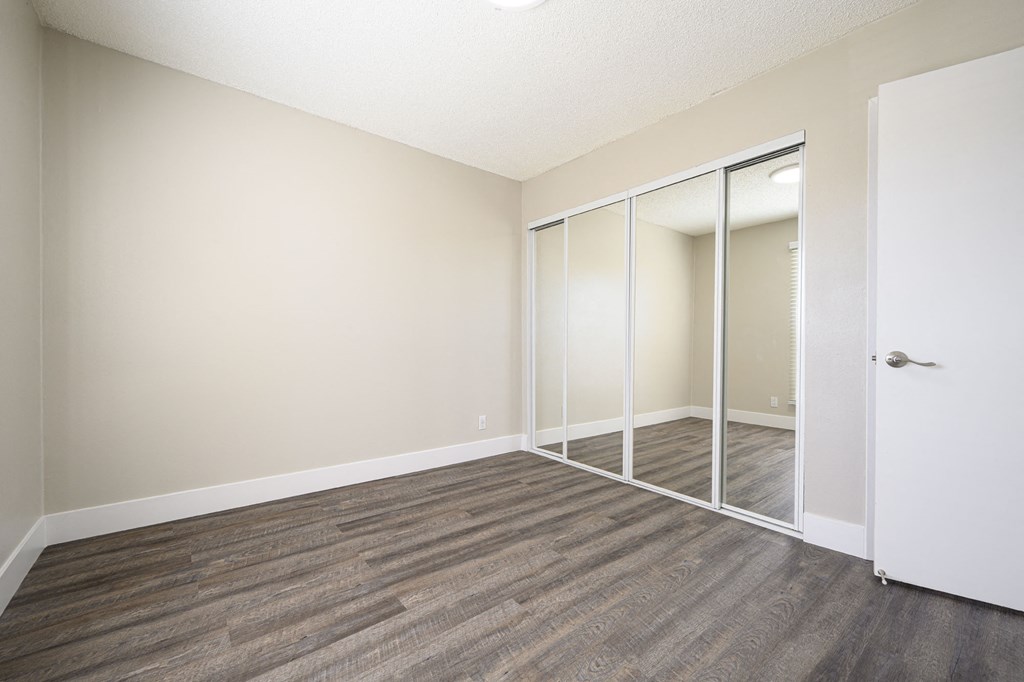 Haddon Hacienda bedroom with mirrored wardrobe closet