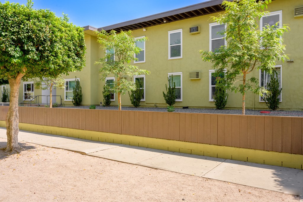 HADDON HACIENDA Exterior Fence and Side of Building