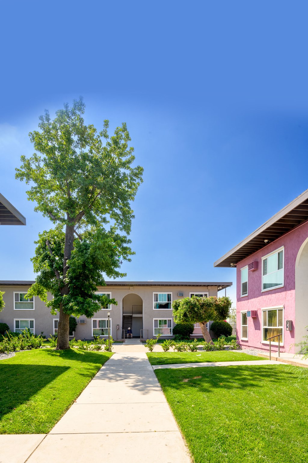 HADDON HACIENDA Pink Building Exterior Walkways