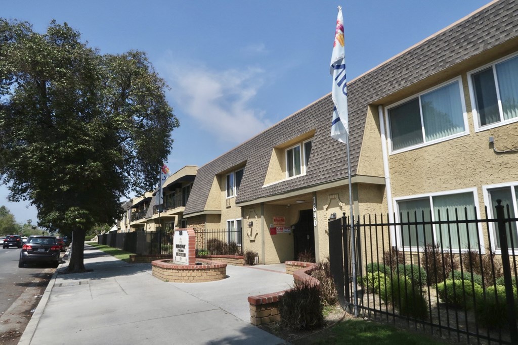 Heritage Park at Woodman sidewalk view