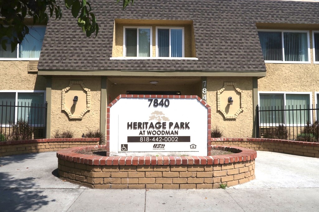 Heritage Park at Woodman signage