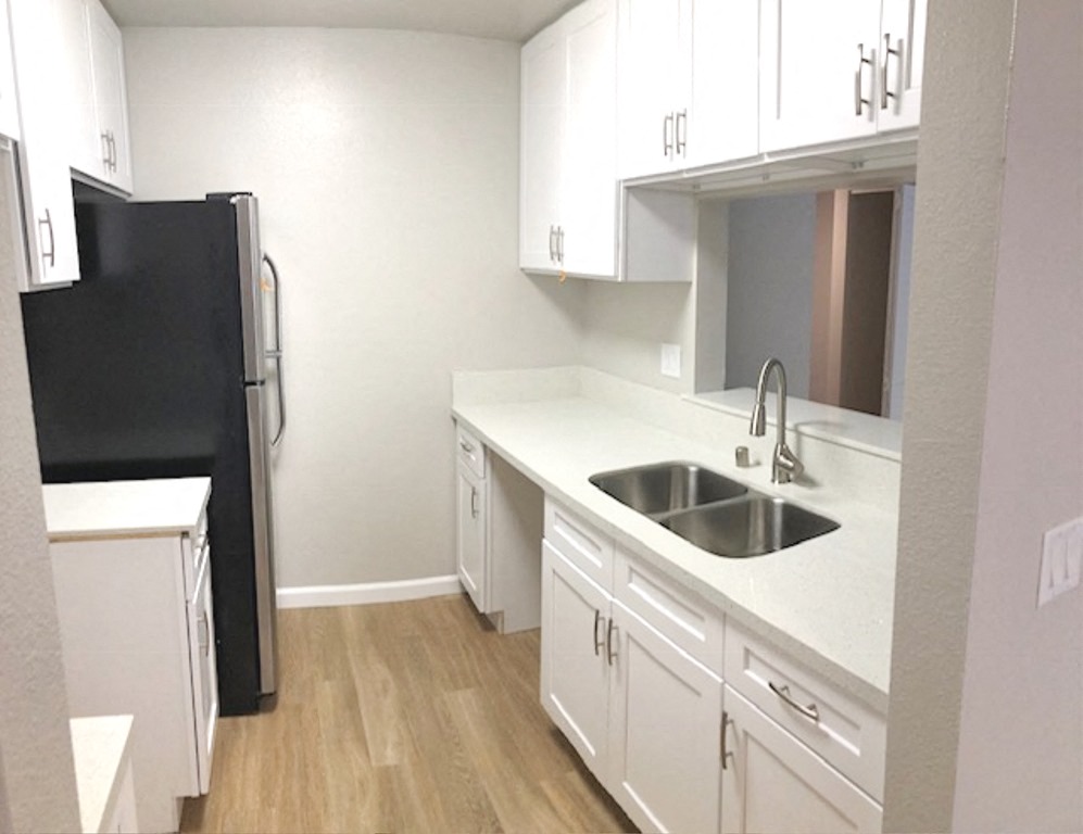 Monarch Terrace kitchen sink and fridge