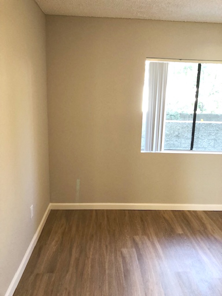 Monarch Terrace unfurnished bedroom with window