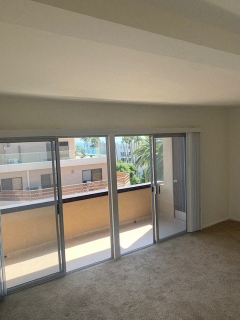 Seaview Apartments living room with balcony