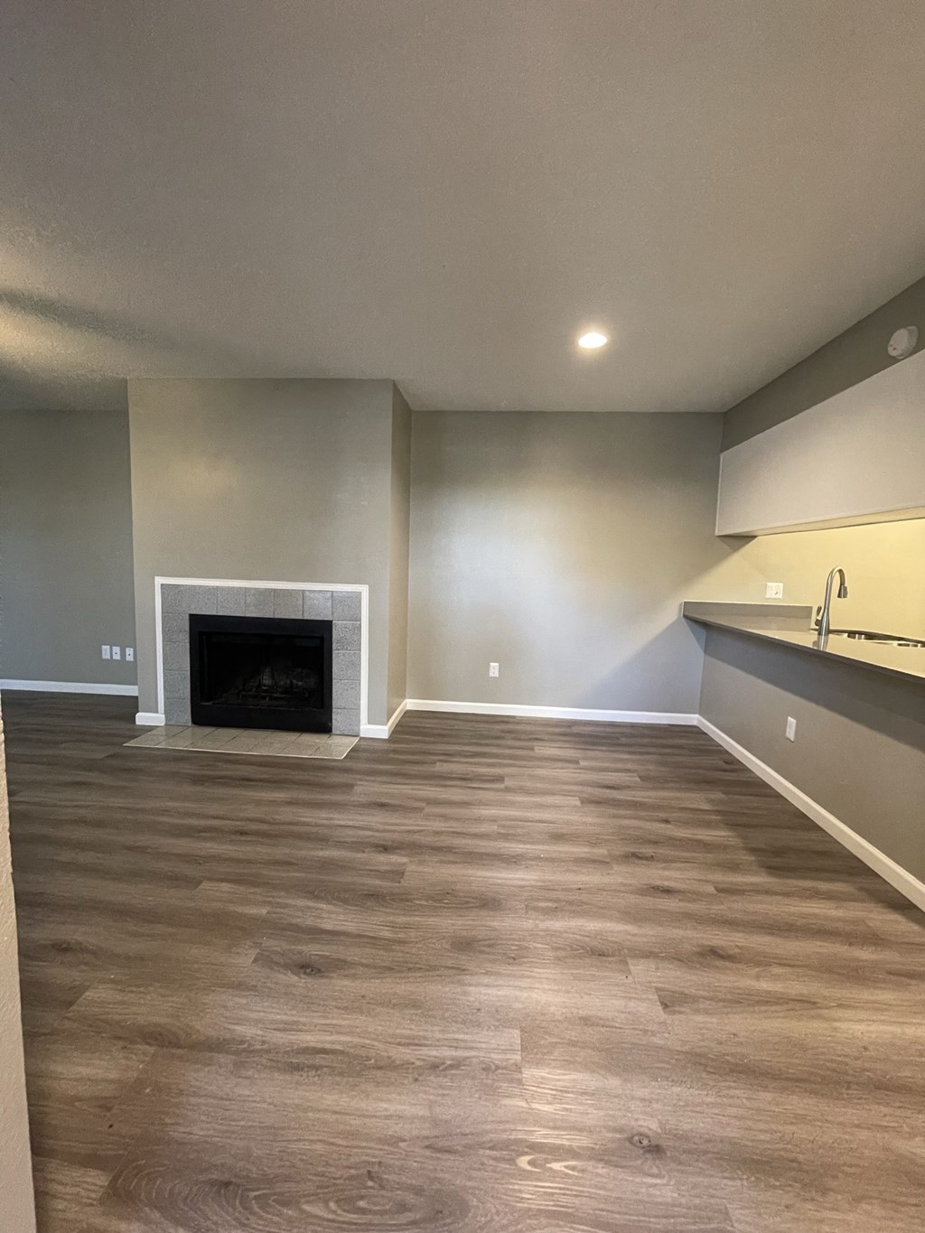 The Forest at Duck Creek Apartments Renovated Dining Room with Fireplace