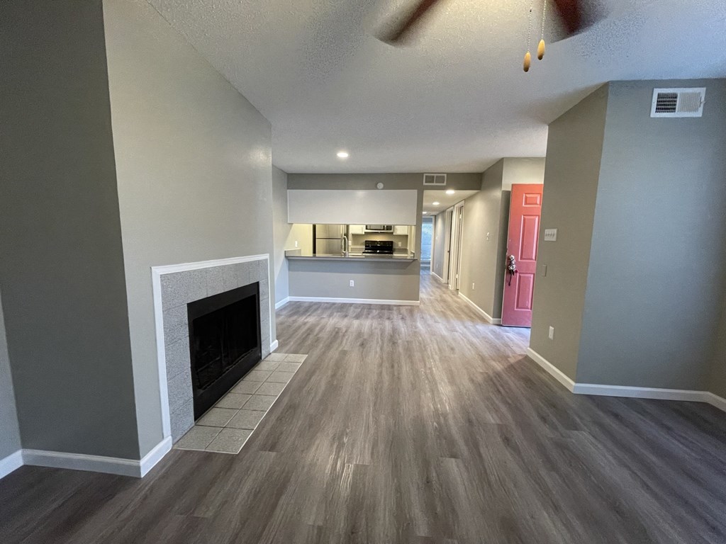 The Forest at Duck Creek Apartments Renovated Living Room with Fireplace