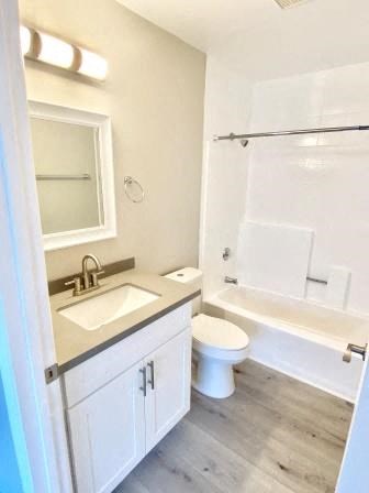 210 Garfield bathroom vanity, toilet, and shower