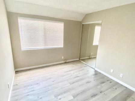 210 Garfield unfurnished bedroom with mirror closet