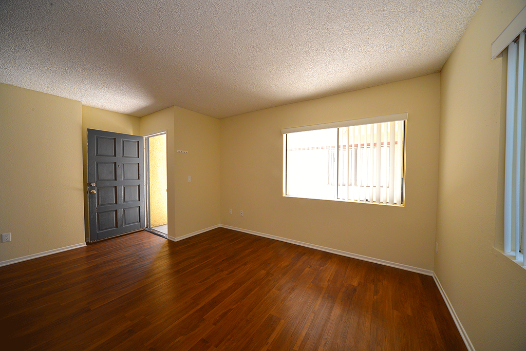 Monarch Terrace unfurnished living room with window