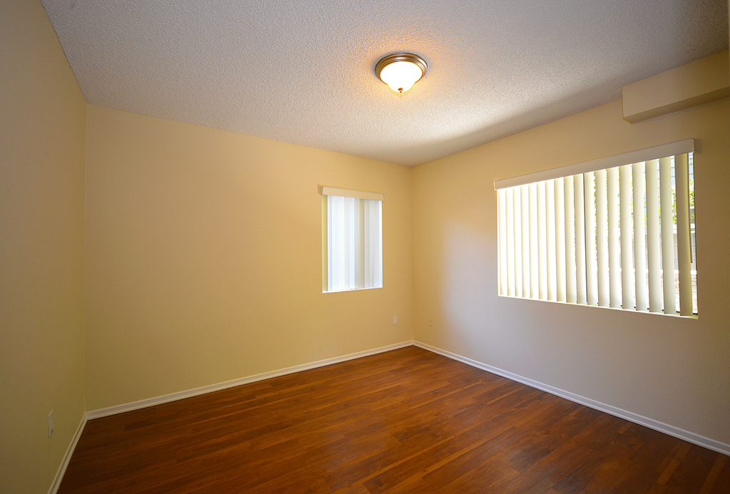 Monarch Terrace unfurnished bedroom with two windows