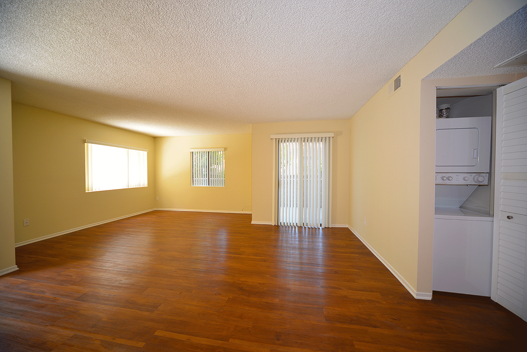 Monarch Terrace unfurnished living room and room with washer and dryer