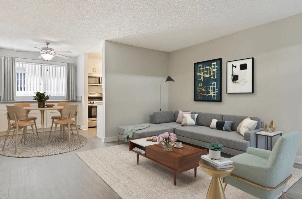 a living room with a couch and a table