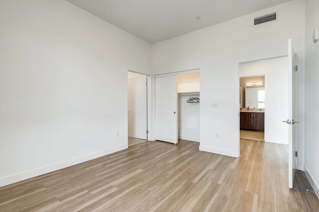 Maya Apartments bedroom with flooring