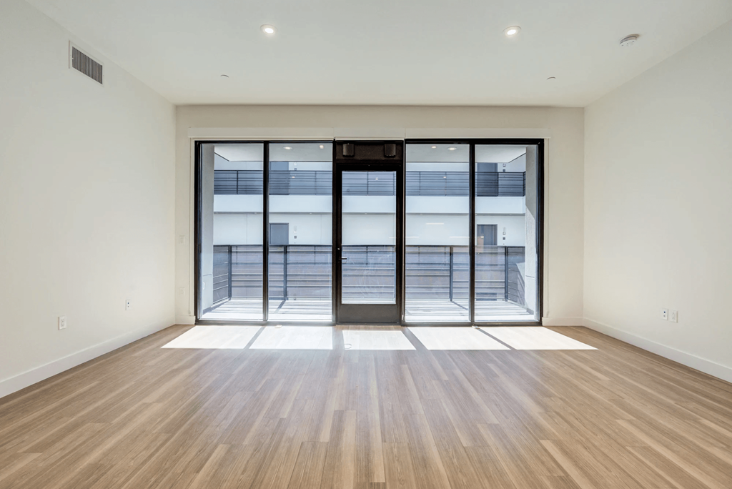 Maya Apartments living area with balcony