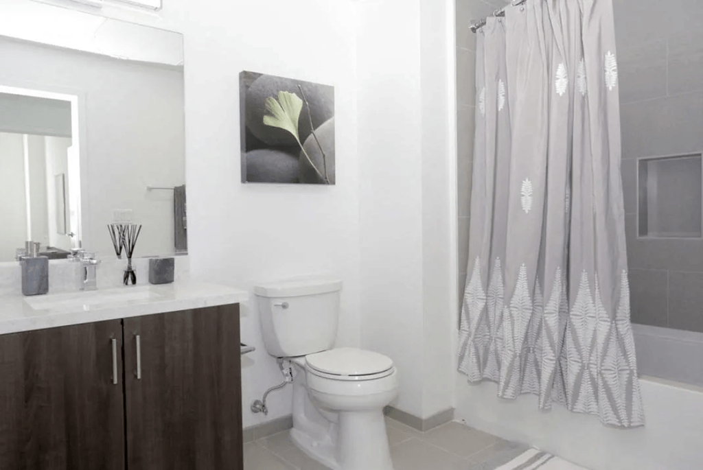 Maya Apartments bathroom with vanity