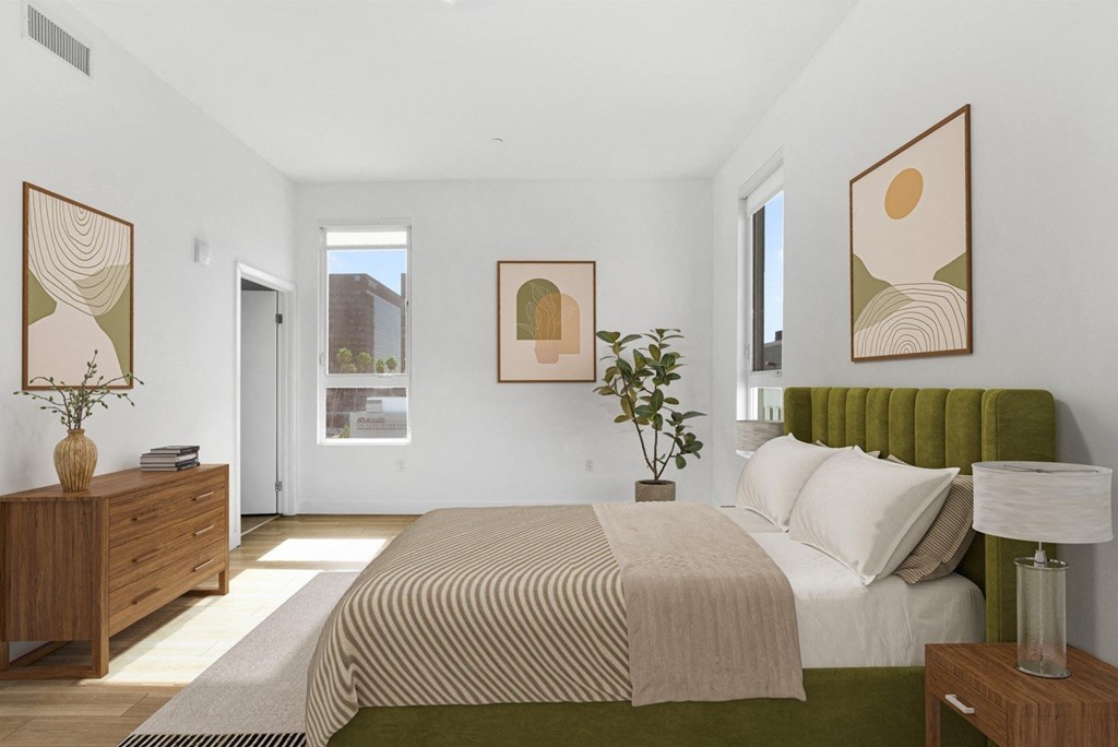 Maya Apartments unit 604 bedroom with windows