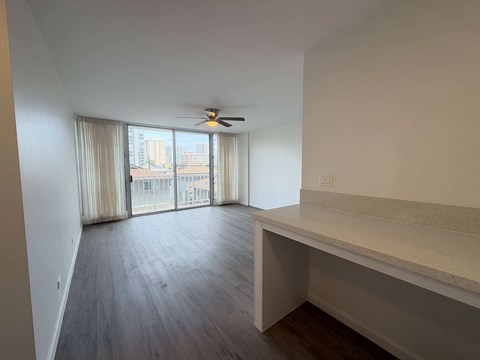 McCully Circle unit 303 living room with sliding doors.