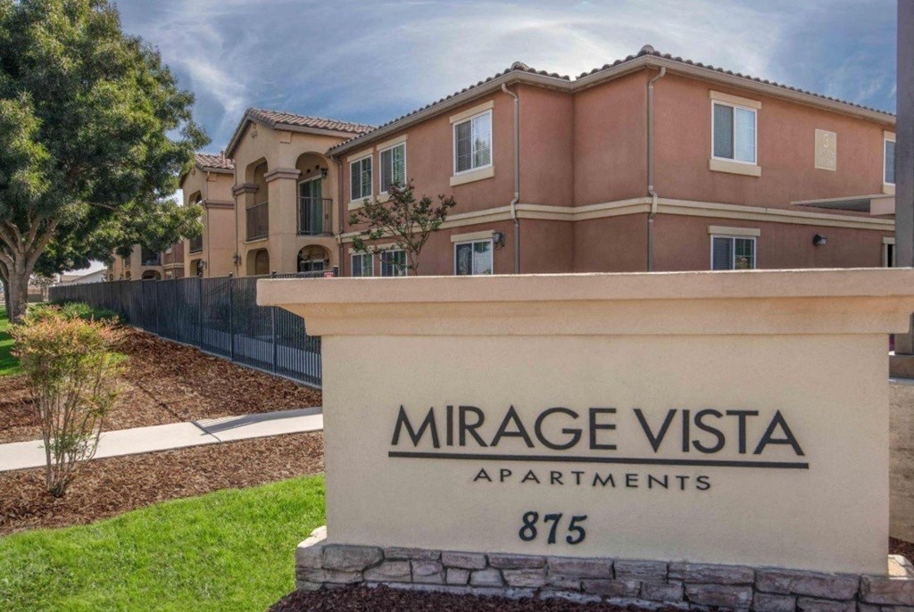 Mirage Vista Apartments is a residential complex with a sign in front.