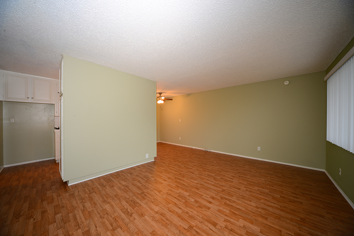 Ocean View Townhomes unfurnished living space with wooden floors