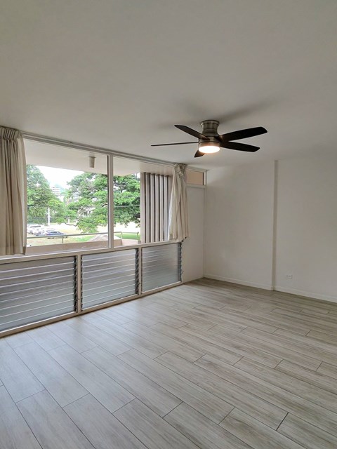 Punahou Circle living room with a ceiling fan.
