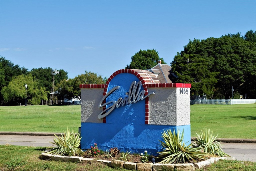 Sevilla Apartments signage