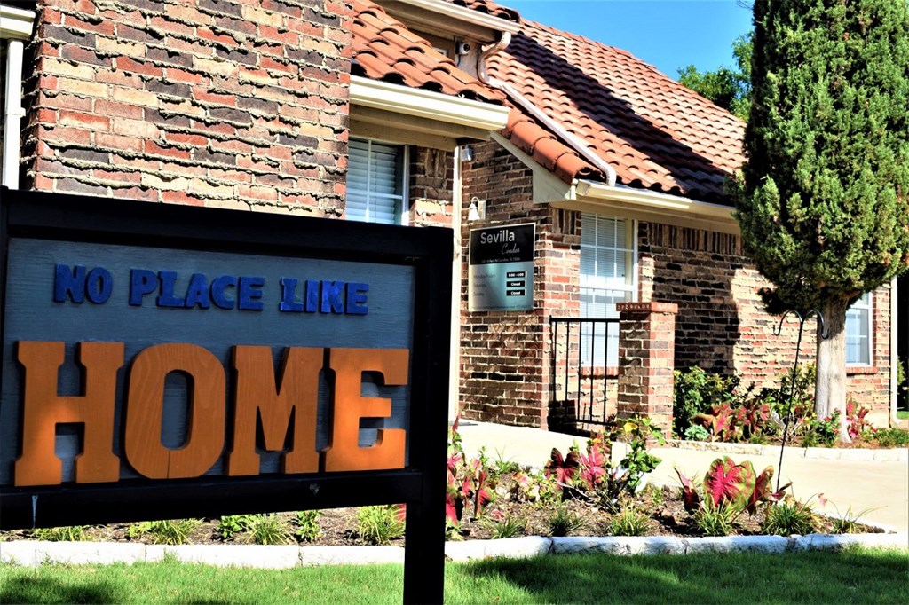 Sevilla Apartments signage