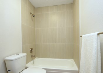 Soco at Alpine Bathroom Toilet and tub shower  - Photo Gallery 16