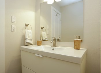 Soco at Alpine Bathroom Sink and mirror with decor - Photo Gallery 17