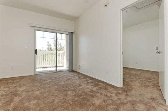 Sorrento Villas unfurnished living room with patio