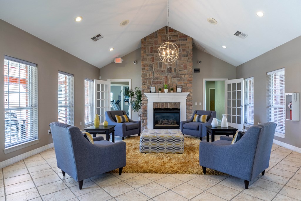 A living room with a fireplace and a couch.
