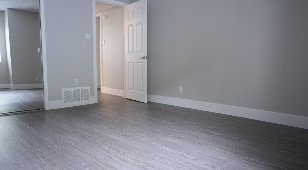 The Canyons at Sherman Oaks unit 6 bedroom with vinyl flooring