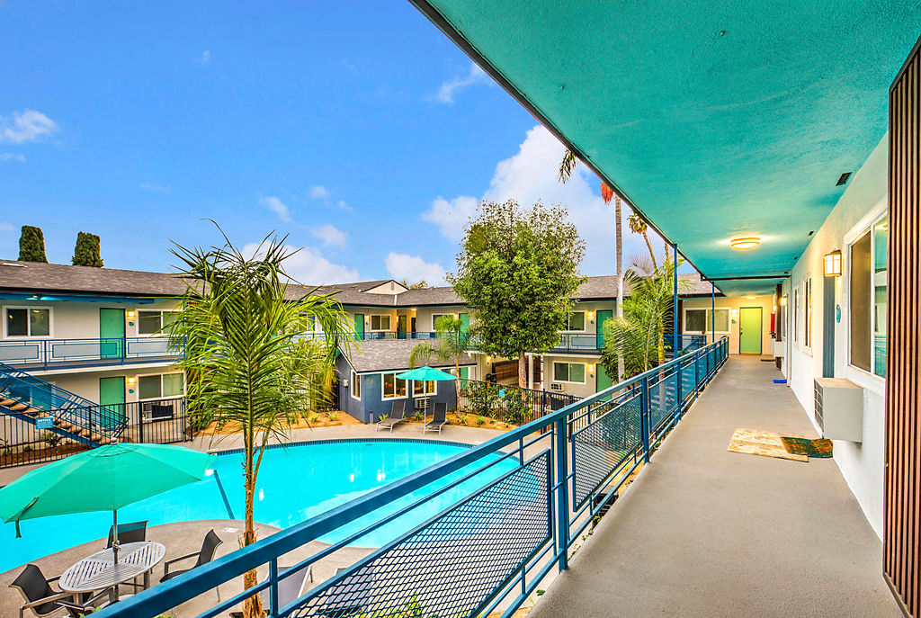 The Island Apartments view of pool from second floor walkway