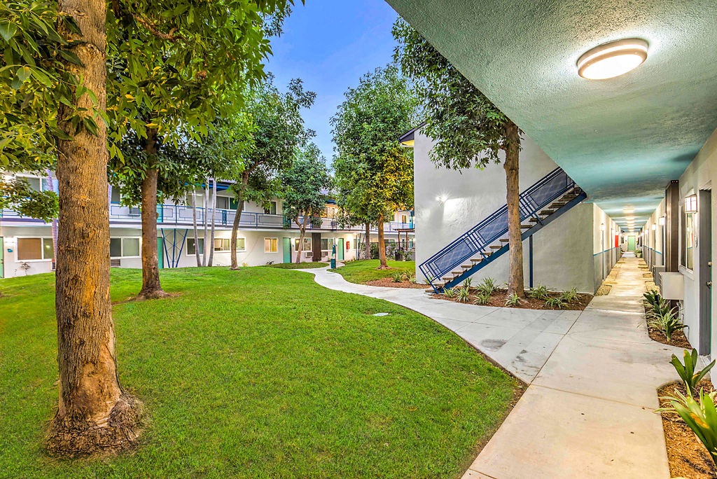 The Island Apartments courtyard grass lawn and pathway