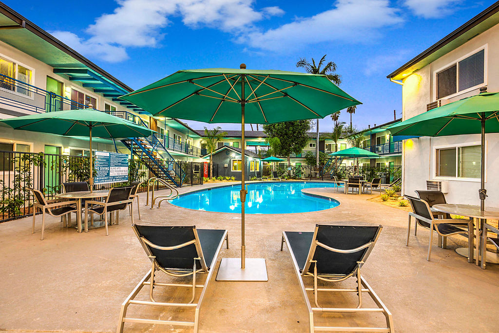 The Island Apartments pool area and lounge chairs
