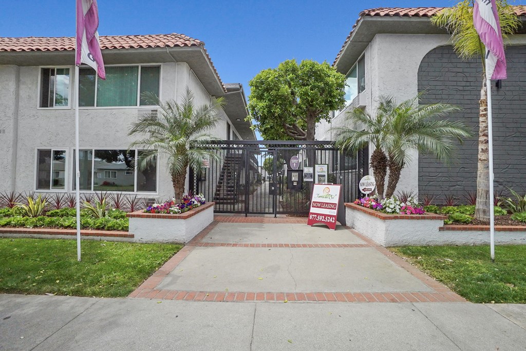 a house with a sign in front of it