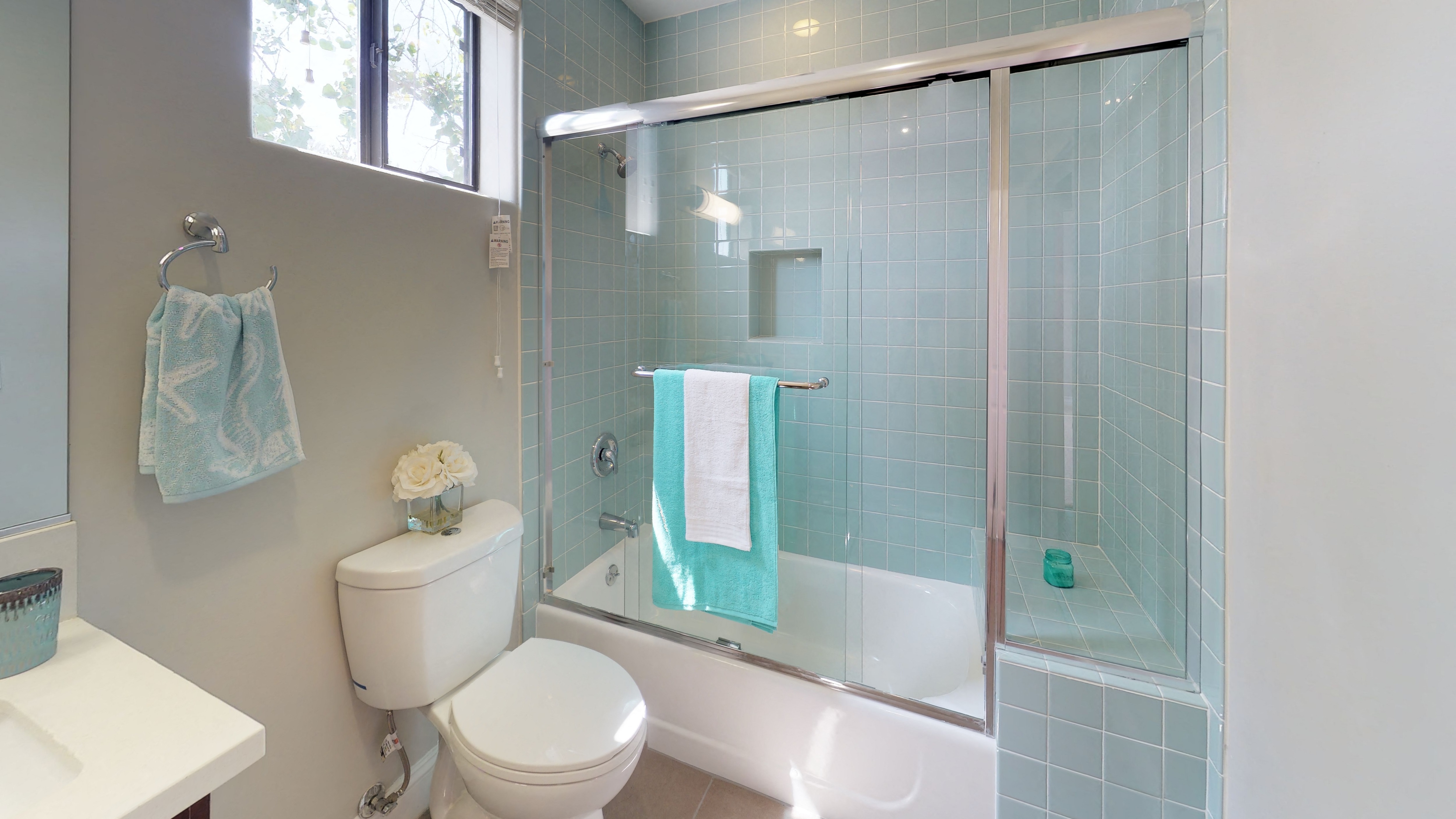 Vista Paradiso three bedroom unit bathroom with shower, toilet, and sink