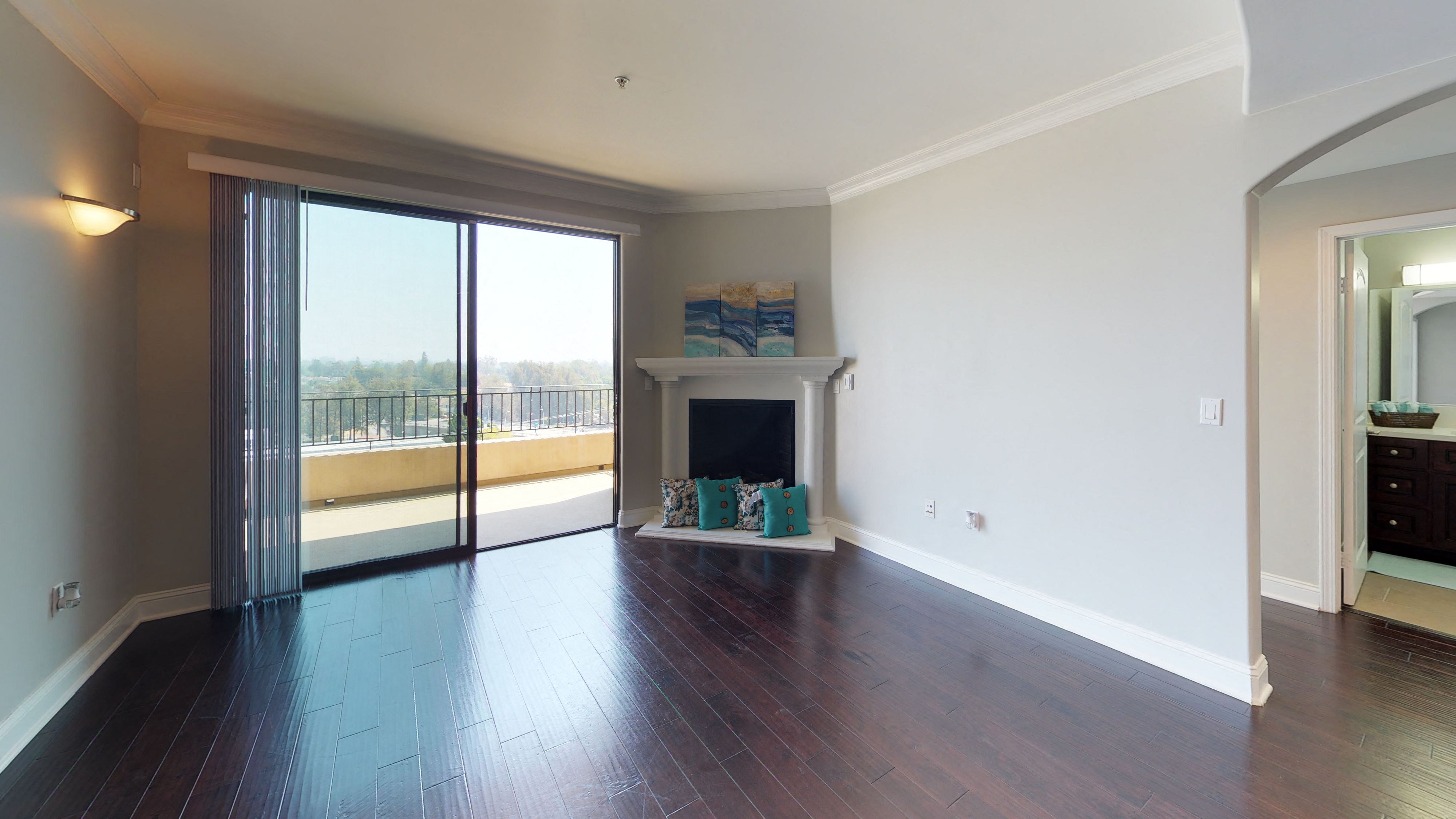 Vista Paradiso three bedroom unit living room with fireplace and sliding doors