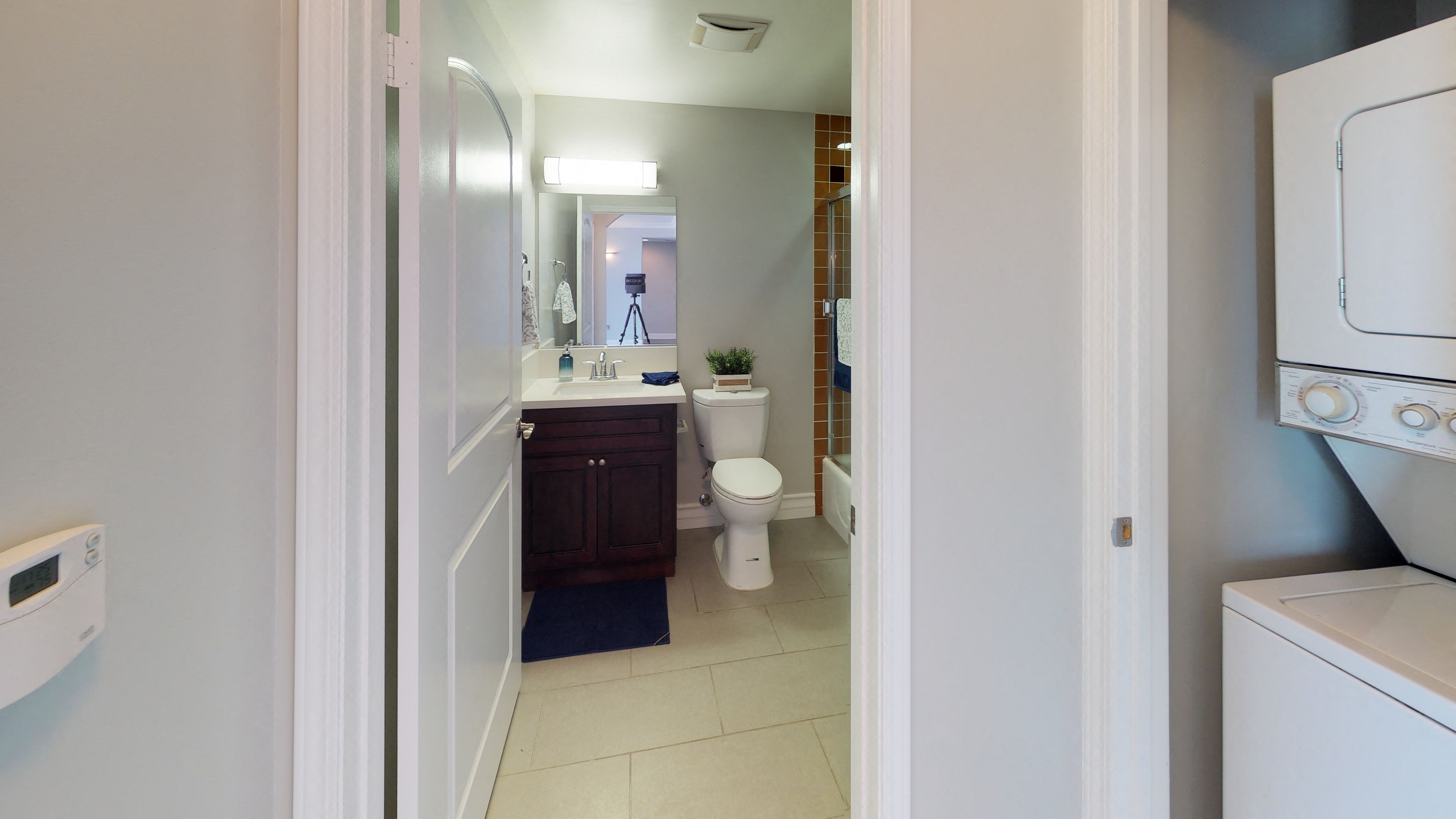 Vista Paradiso two bedroom unit interior bathroom with sink, toilet, and shower