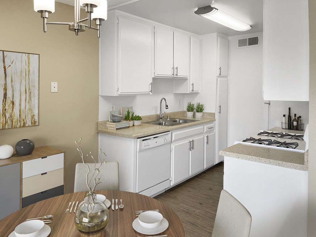 a kitchen and dining area in a 555 waverly unit