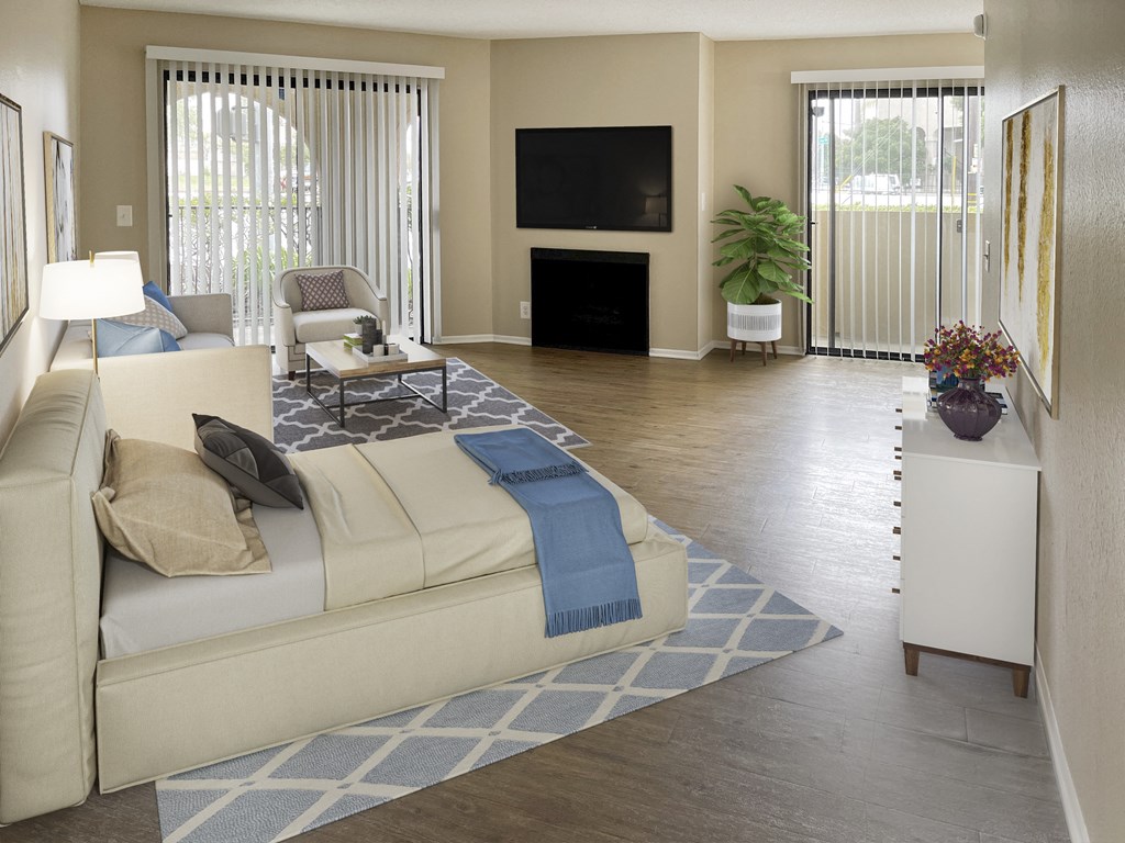 a living room filled with furniture and a large window