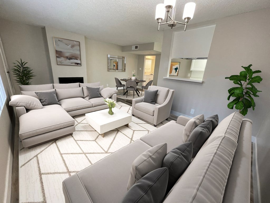 Woodman Lassen Living Room with Fireplace and Dining Room