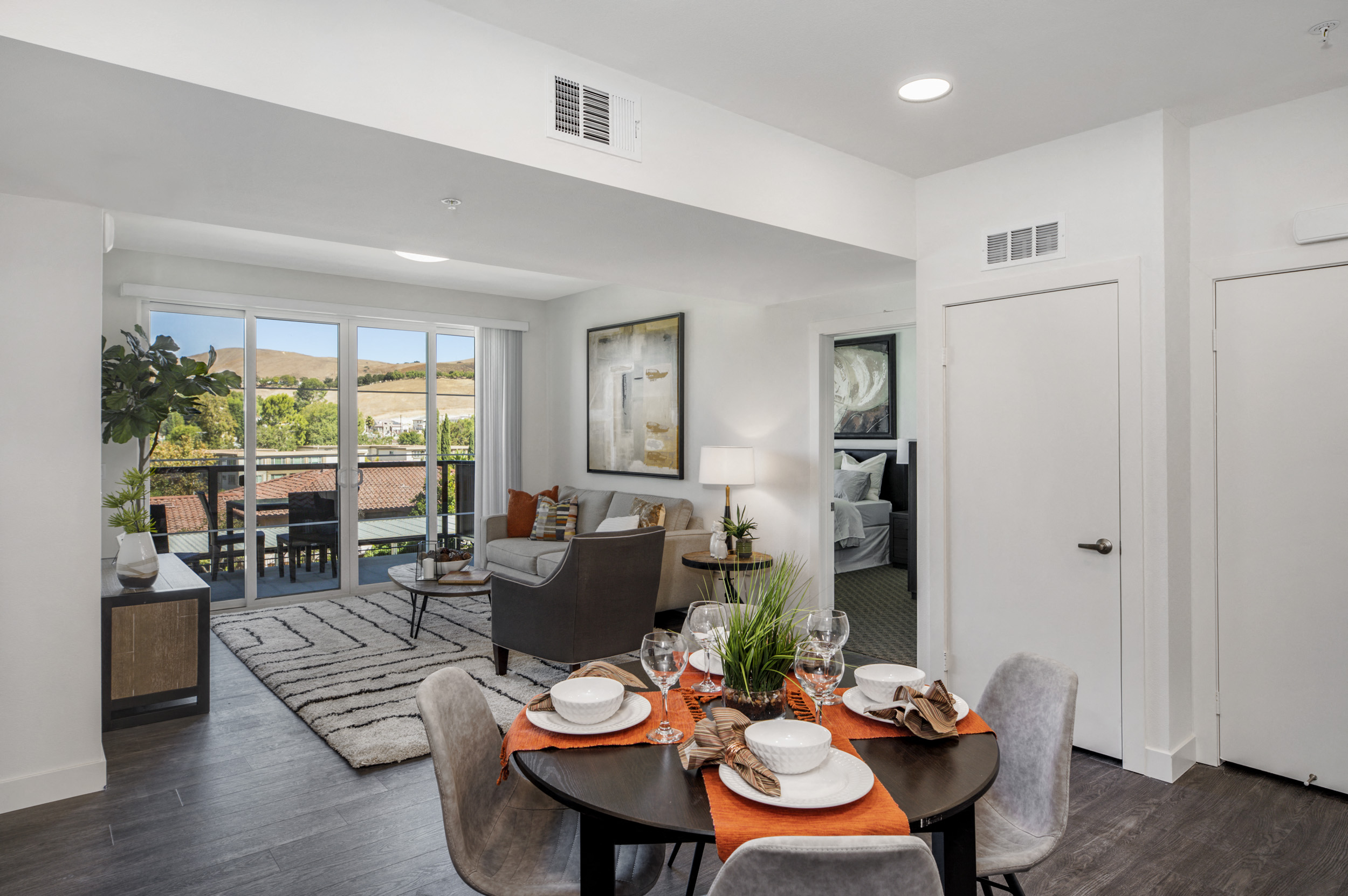 YOLO East furnished dining and living area