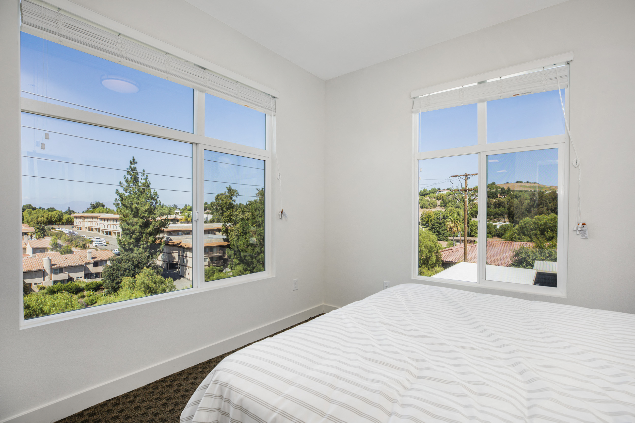 YOLO East bedroom with two windows