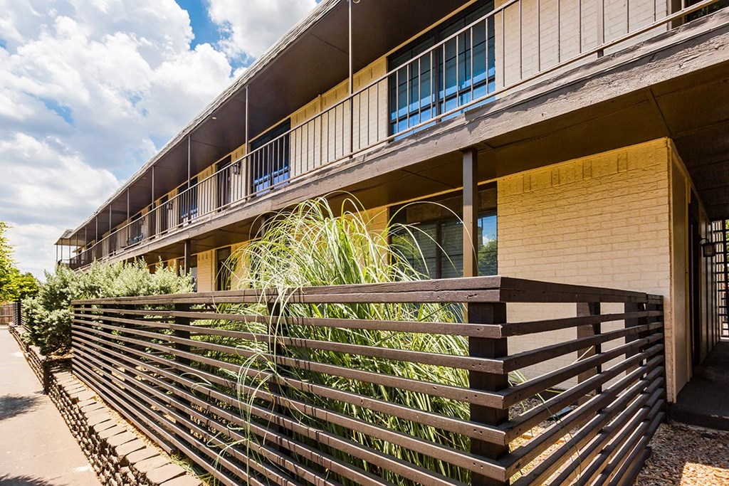 LaVita on Lovers Lane exterior building, fence, and plants