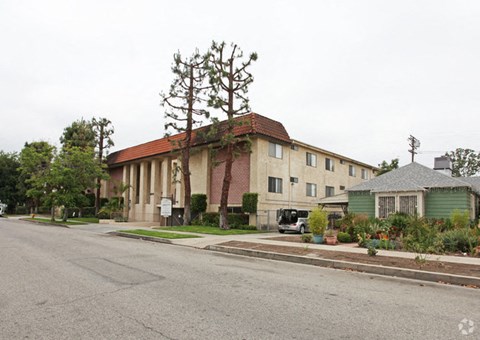 Agnes Apartments exterior building with trees