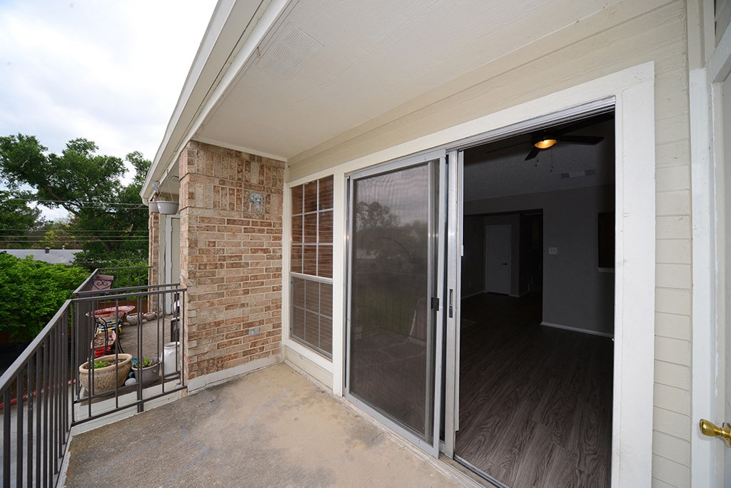 Brownstone Townhomes Balcony with large sliding glass doors