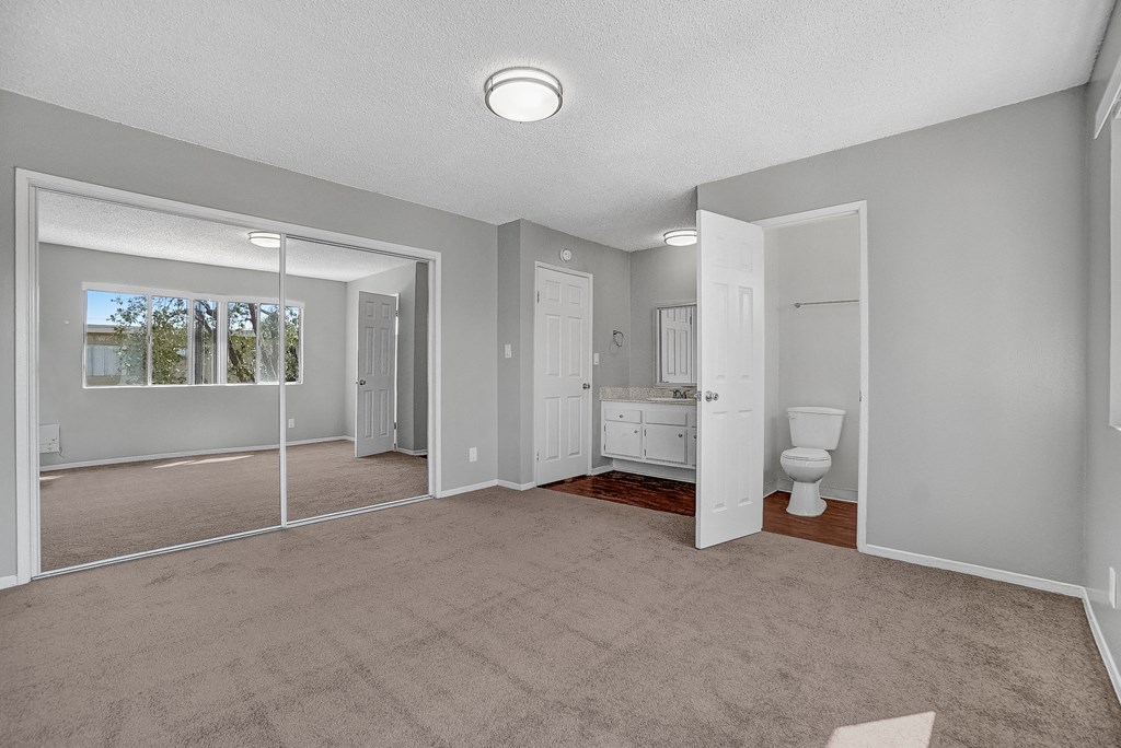 capistrano gardens unit 105 bedroom with view of bathroom