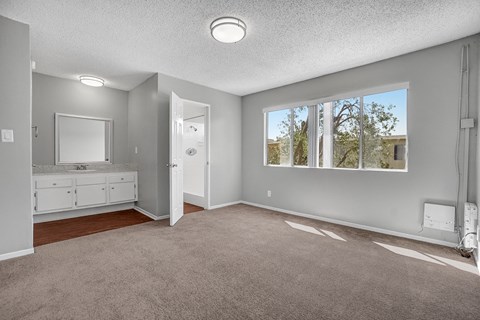 capistrano gardens unit 105 bedroom with view of vanity