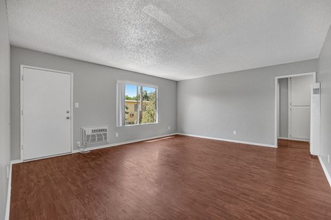 capistrano gardens unit 105 living room with view of front door