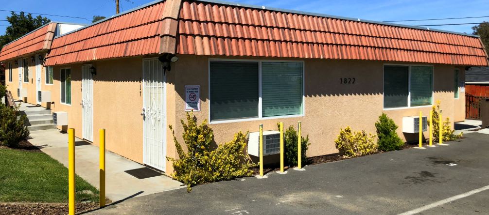 Limoncello Apartments exterior building and lot